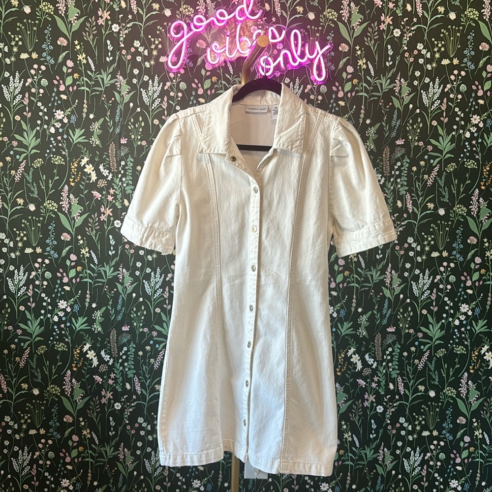 Jean button mini dress.  Worn as a dress or styled open as a layering piece